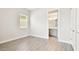 Well-lit bedroom with adjacent bath at 2973 Breezy Meadows, Clearwater, FL 33760