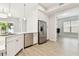 Modern kitchen featuring stainless steel appliances, white cabinetry, and seamless design at 2973 Breezy Meadows, Clearwater, FL 33760