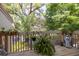 Balcony view with lush greenery and outdoor decor at 307 Los Prados Dr # 307, Safety Harbor, FL 34695