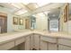 Bathroom features a spacious vanity with dual sinks and lots of mirror space at 307 Los Prados Dr # 307, Safety Harbor, FL 34695