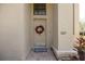 Inviting front door with wreath, house number, and a decorative welcome mat at 307 Los Prados Dr # 307, Safety Harbor, FL 34695
