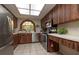 Modern kitchen with stainless steel appliances, lots of cabinet space, and ample natural light at 307 Los Prados Dr # 307, Safety Harbor, FL 34695