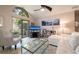 Bright living room featuring a large window, comfortable seating, and modern decor at 307 Los Prados Dr # 307, Safety Harbor, FL 34695