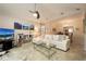 Cozy living room with a comfortable sofa, entertainment center, and neutral decor at 307 Los Prados Dr # 307, Safety Harbor, FL 34695