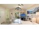 Airy living room with a large window, comfortable seating, and easy access to other rooms at 307 Los Prados Dr # 307, Safety Harbor, FL 34695