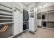 Large walk-in closet with custom shelving and drawers at 3326 Barbour Trl, Odessa, FL 33556