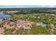 Community aerial view highlighting landscaped grounds, condo buildings, and amenities at 3620 41St S Way # B, St Petersburg, FL 33711