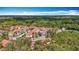 Community aerial showing the residences surrounded by green foliage and parking at 3620 41St S Way # B, St Petersburg, FL 33711
