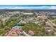 Aerial view displaying the community's layout with tennis courts and parking areas at 3620 41St S Way # B, St Petersburg, FL 33711