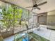 Screened in patio with ceiling fan and outdoor seating at 3620 41St S Way # B, St Petersburg, FL 33711