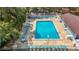 Beautiful community pool with ample seating and a well-maintained brick patio area at 3620 41St S Way # B, St Petersburg, FL 33711