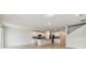 Spacious open-concept kitchen featuring an island with stainless steel appliances at 3860 Obsidian Dr, Spring Hill, FL 34609