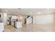 Bright and airy living room area, open kitchen and featuring tile floors throughout at 3860 Obsidian Dr, Spring Hill, FL 34609