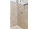 Close-up of tiled shower with a niche and chrome fixtures at 3860 Obsidian Dr, Spring Hill, FL 34609