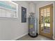 View of the water heater with access to the side yard at 39542 Friends Ave, Zephyrhills, FL 33540