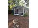 Charming single Gathering home boasts a screened porch and a well maintained yard at 4016 N Seminole Ave, Tampa, FL 33603