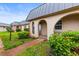 A well-manicured lawn leads to a charming residence at 4305 Summersun Dr, New Port Richey, FL 34652