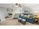 Charming living room featuring a comfortable seating area and stylish decor at 4305 Summersun Dr, New Port Richey, FL 34652