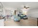 Cozy living room with beach-themed decor and plenty of natural light at 4305 Summersun Dr, New Port Richey, FL 34652