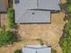 Bird's eye view of home's roof and surrounding dry lawn at 4623 Wisteria Dr, Zephyrhills, FL 33542