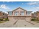 Beautiful two-story townhome featuring a multi-car garage and charming upper balconies at 5176 6Th N St, St Petersburg, FL 33703