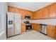Well-equipped kitchen boasting stainless steel appliances and wood cabinetry at 5176 6Th N St, St Petersburg, FL 33703