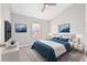 Staged main bedroom with decor and a large bed at 5176 6Th N St, St Petersburg, FL 33703
