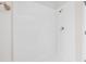 Bathroom walk-in shower with white tile walls at 5176 6Th N St, St Petersburg, FL 33703