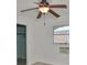 Bedroom featuring light walls, wood-look ceiling fan, and a window at 5219 4Th S St, St Petersburg, FL 33705