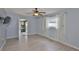 A bright bedroom with an ensuite lanai room through the door at 5219 4Th S St, St Petersburg, FL 33705