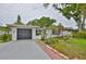 Charming single-story home featuring a well-manicured lawn and a paved walkway at 5219 4Th S St, St Petersburg, FL 33705