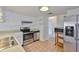 A bright kitchen with stainless steel appliances and tile flooring at 5219 4Th S St, St Petersburg, FL 33705