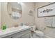 Well-lit bathroom featuring a round mirror, sleek vanity, and shower-tub combination with a striped curtain at 6140 Marina Cove S Way, St Petersburg, FL 33712