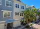 Charming multi-story townhomes with colorful facades and well-maintained landscaping at 6140 Marina Cove S Way, St Petersburg, FL 33712