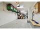 Spacious garage with storage shelves, ample workspace, and clean flooring at 6140 Marina Cove S Way, St Petersburg, FL 33712