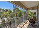 Enjoy the outdoors on this screened porch with tiled flooring and comfortable rocking chairs with beautiful views at 6140 Marina Cove S Way, St Petersburg, FL 33712