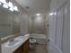Full bathroom with tub, tiled shower, vanity and sink at 6250 Maisie Rd, Zephyrhills, FL 33542