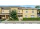 Exterior of a two-story home with green landscaping and parking at 6250 Maisie Rd, Zephyrhills, FL 33542
