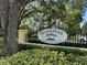 Eiland Park townhome community sign surrounded by mature trees and manicured landscaping at 6250 Maisie Rd, Zephyrhills, FL 33542