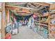 Interior view of a cluttered storage shed at 653 E Spruce St, Tarpon Springs, FL 34689