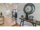Charming hallway showcasing stylish decor, neutral tones, and an inviting view into the home's open living spaces at 8704 N Brooks St, Tampa, FL 33604