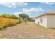 Spacious backyard with a wood fence offering privacy, mature trees, and ample space for outdoor activities at 9422 Clover Glen Dr, Riverview, FL 33569