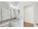 Clean bathroom features a modern vanity and an open entrance to a bedroom at 9422 Clover Glen Dr, Riverview, FL 33569