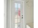 Bright bathroom includes a bathtub with shower and a frosted glass door at 9422 Clover Glen Dr, Riverview, FL 33569