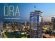 Striking exterior view of ORA high-rise condos, featuring city views and rooftop helicopter pad at 1101 E Jackson St # 2502, Tampa, FL 33602