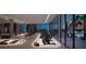 Bright gym features modern equipment, floor-to-ceiling windows, and access to the poolside lounge area at 1101 E Jackson St # 2502, Tampa, FL 33602