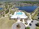 Enjoy luxurious community amenities, including a pool and lake, perfect for relaxation and recreation at 11013 Leland Groves Dr, Riverview, FL 33579
