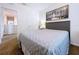 Comfortable bedroom with soft lighting, neutral walls, and carpet flooring, creating a cozy and restful atmosphere at 11013 Leland Groves Dr, Riverview, FL 33579