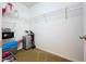 Spacious walk-in closet with shelving providing ample storage for clothes and accessories at 11013 Leland Groves Dr, Riverview, FL 33579