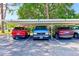Assigned carport featuring four parking spots, each numbered with white paint at 11200 102Nd Ave # 75, Seminole, FL 33778